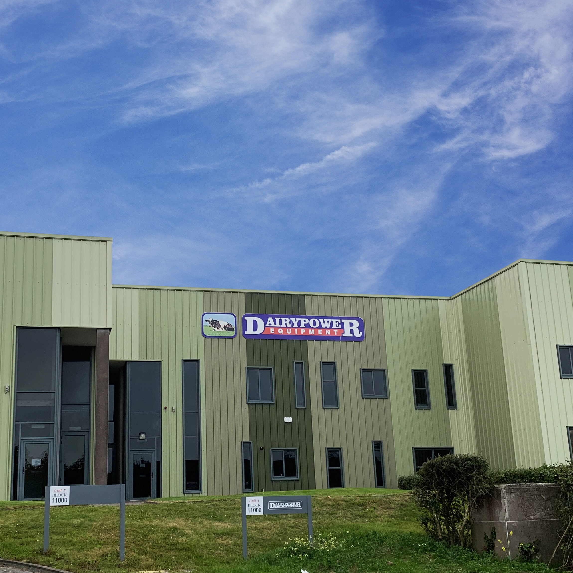 Dairy Power headquarters building on a sunny day with blue skies above the building