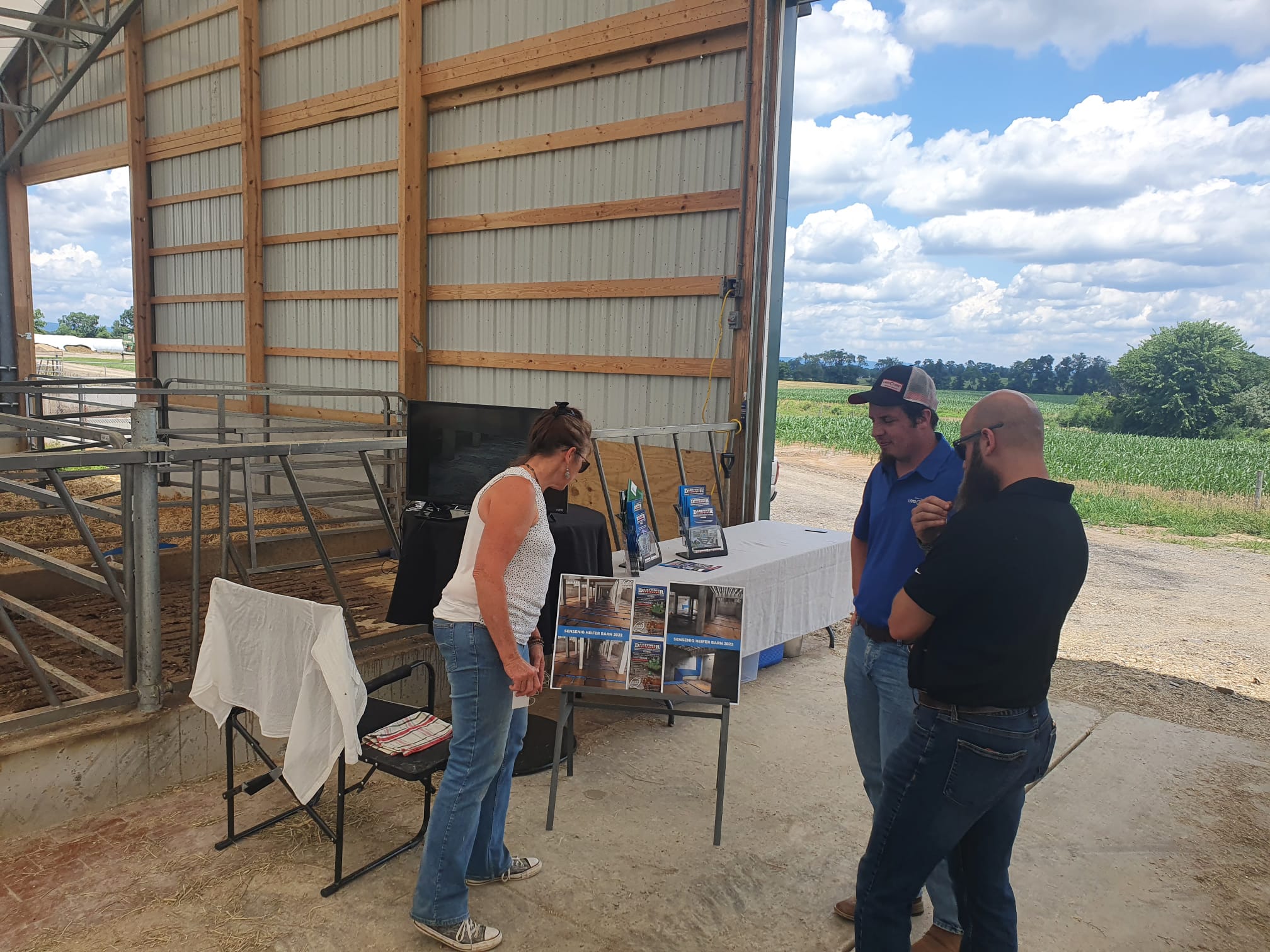 North American Manure Expo with Troop Equipment with three people viewing products