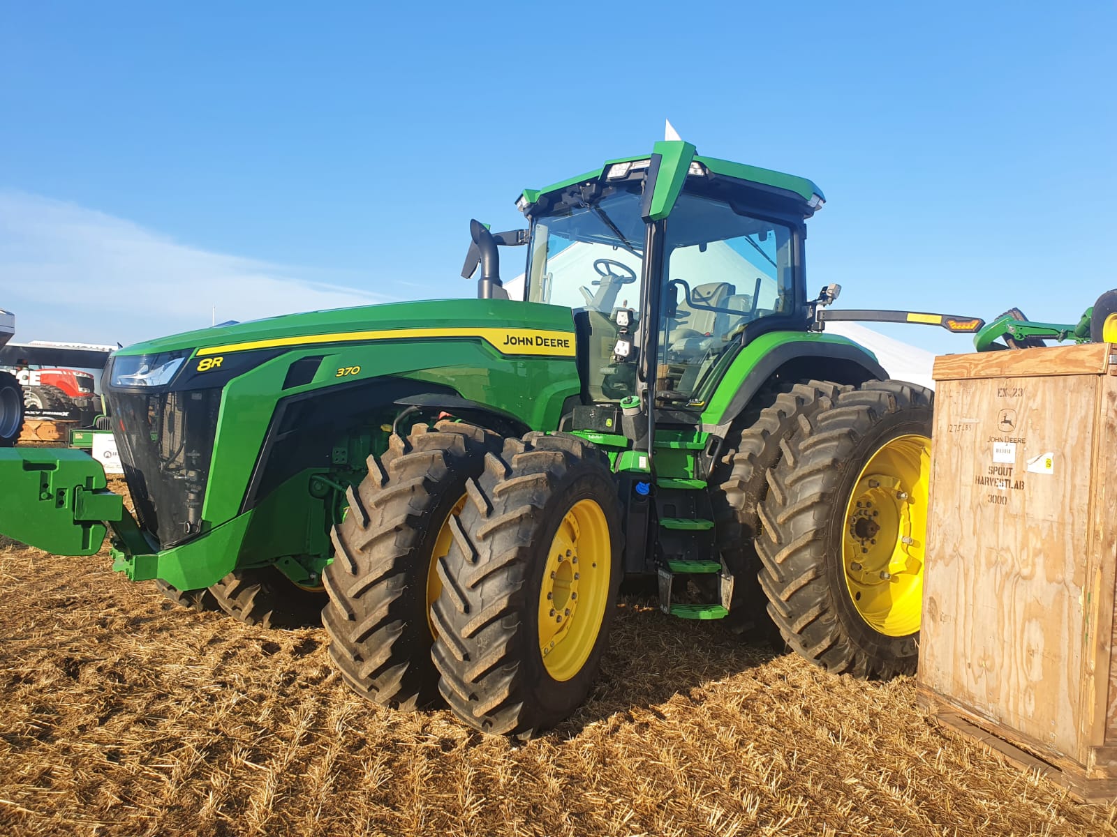 North American Manure Expo with Troop Equipment showing green tractor