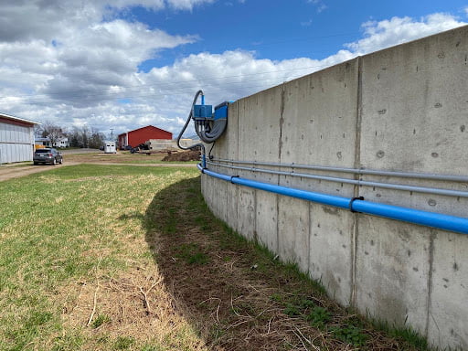 Eric Griffin Agri Equip, Nova Scotia showing Slurry Management device attached to a building