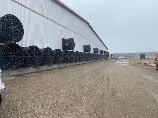 Canadian Installation of Dairy Power slurry management systems showing outside of barn